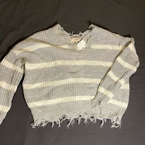 New with tags grey and white stripped grungy v neck sweater